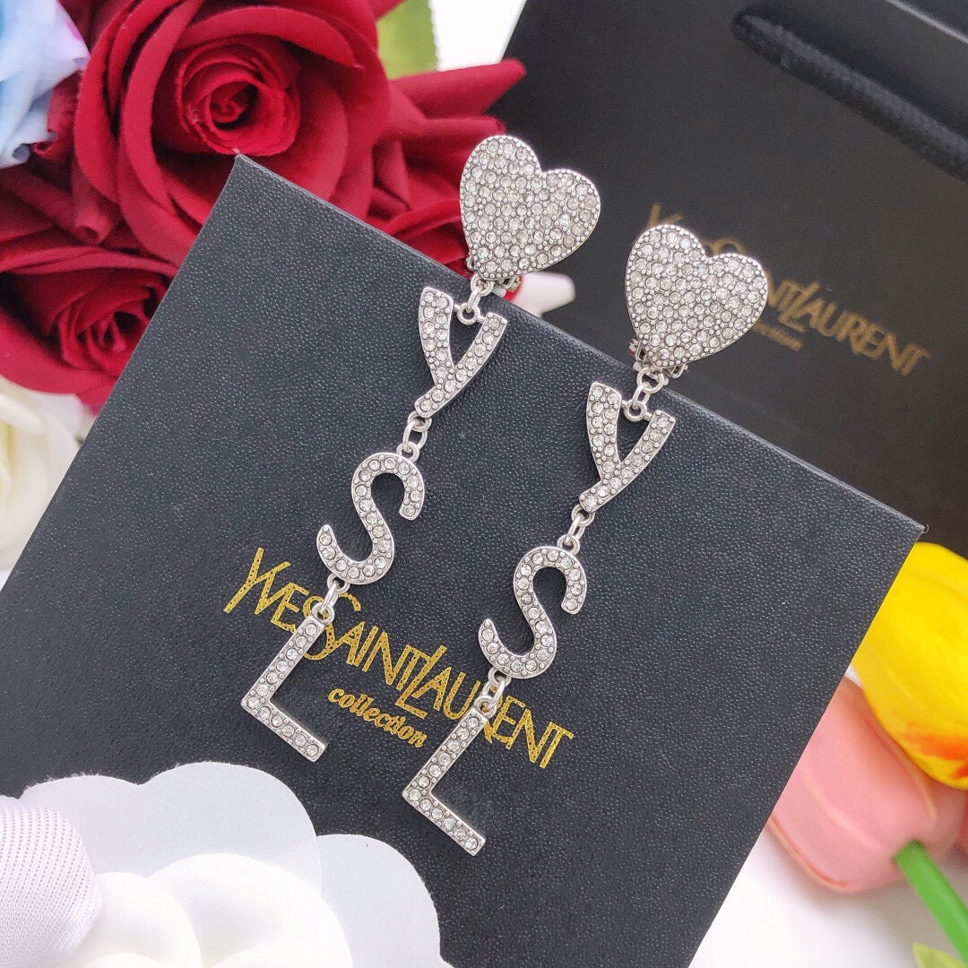 Martin Graham stud earrings in polished metal-tone – front product view