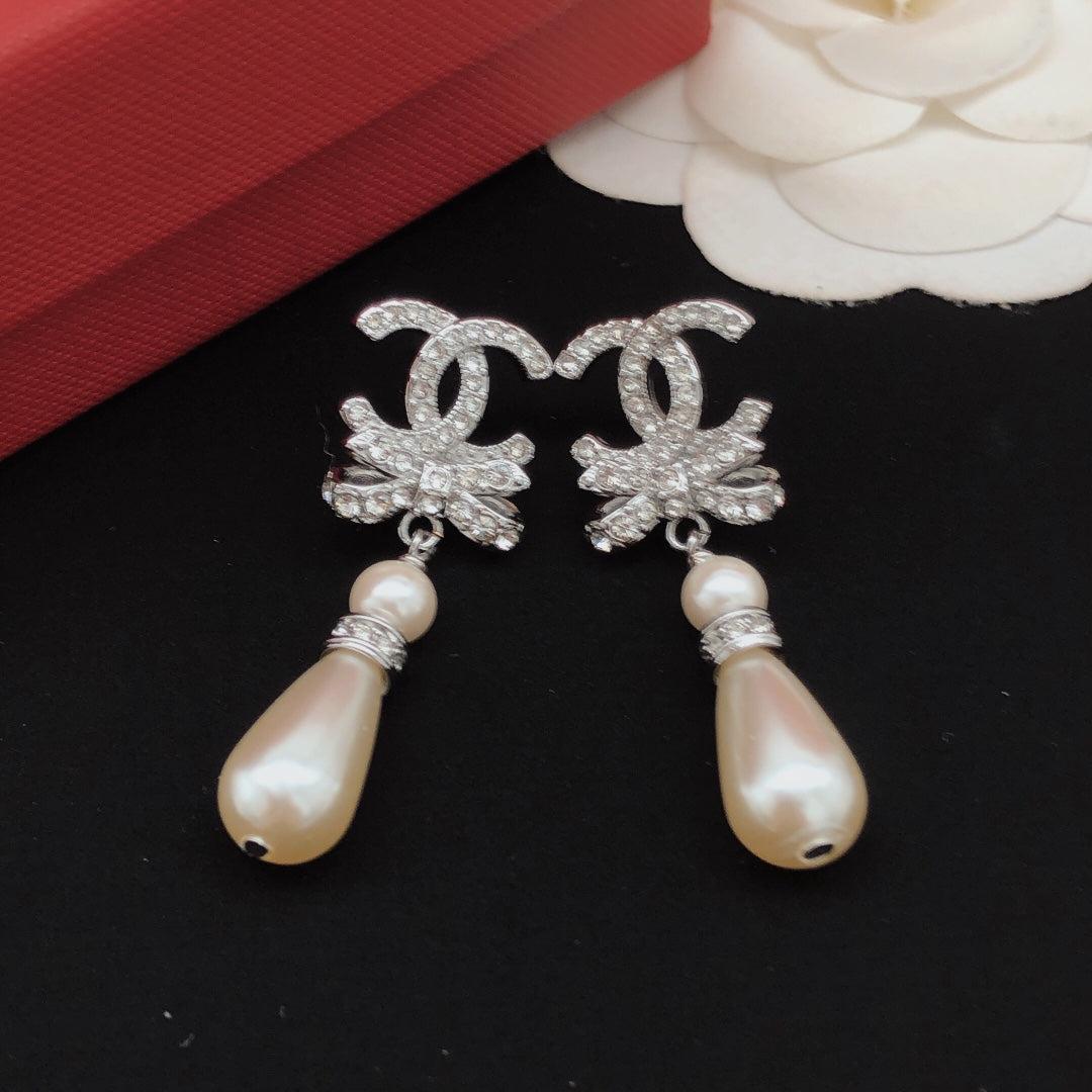 Martin Graham stud earrings in polished metal-tone – main product view