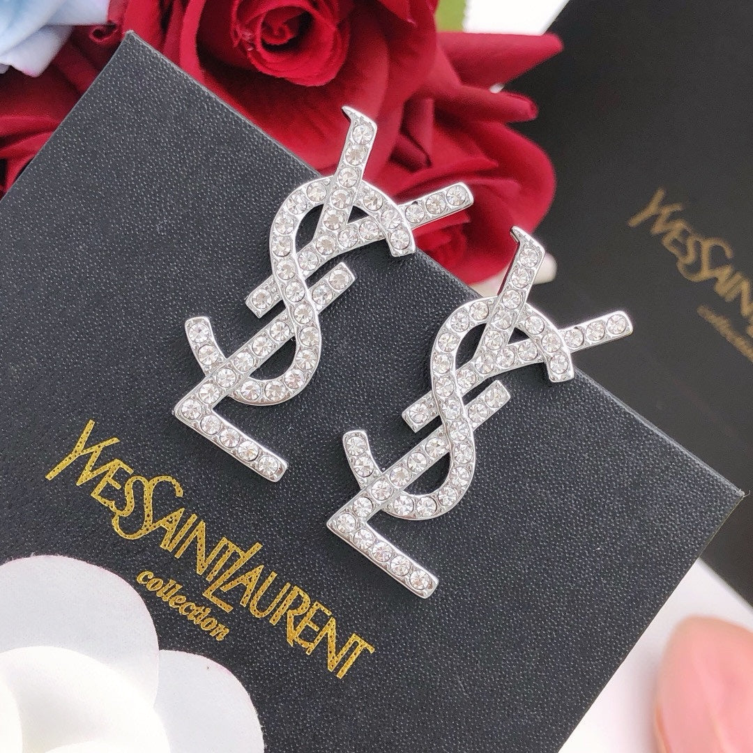 Martin Graham stud earrings in polished metal-tone – front product view