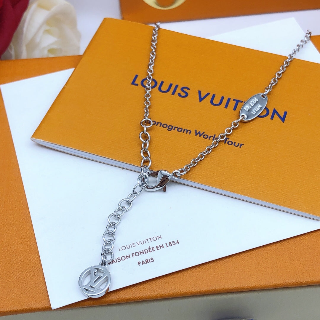 Martin Graham pendant necklace in polished metal-tone – side detail