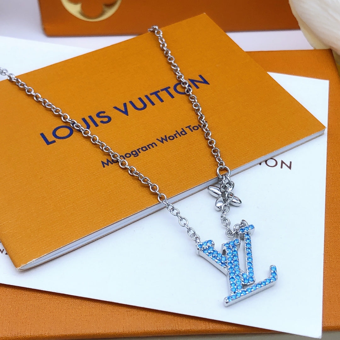 Martin Graham pendant necklace in polished metal-tone – close-up detail
