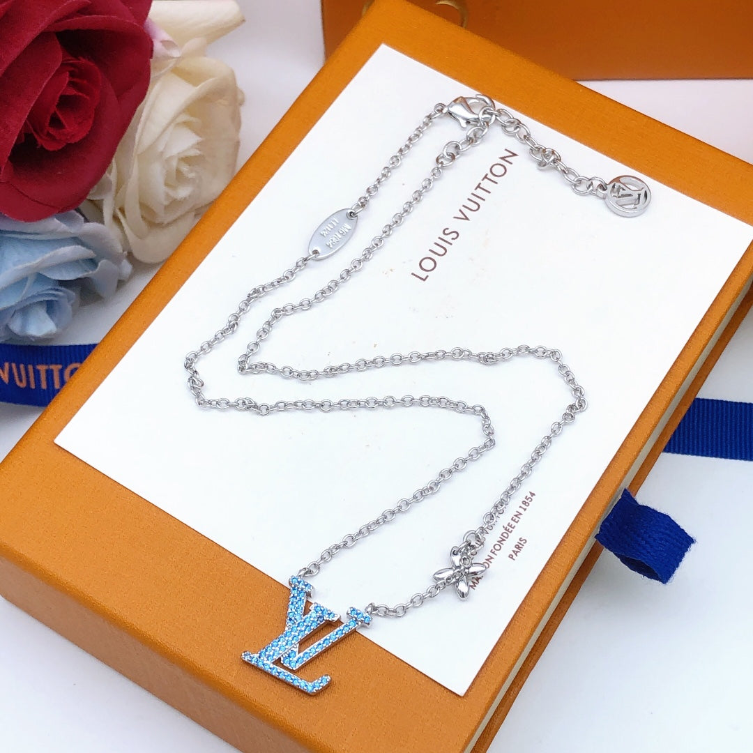 Martin Graham pendant necklace in polished metal-tone – styled product view