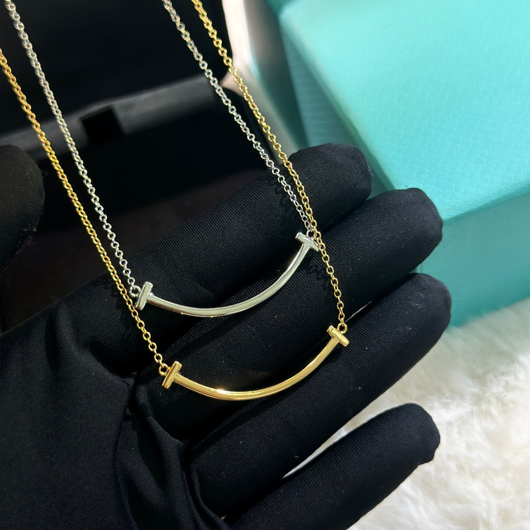 Martin Graham pendant necklace in polished metal-tone – side detail