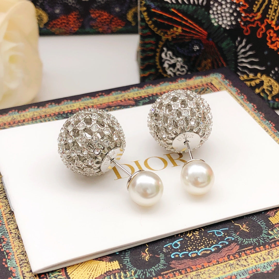 Martin Graham stud earrings in polished metal-tone – side detail
