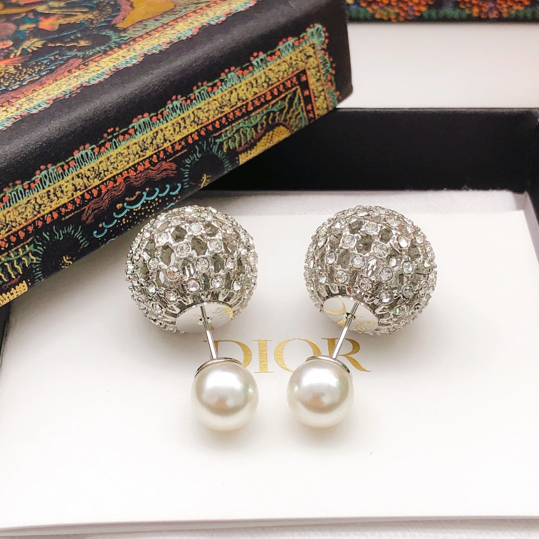 Martin Graham stud earrings in polished metal-tone – front view