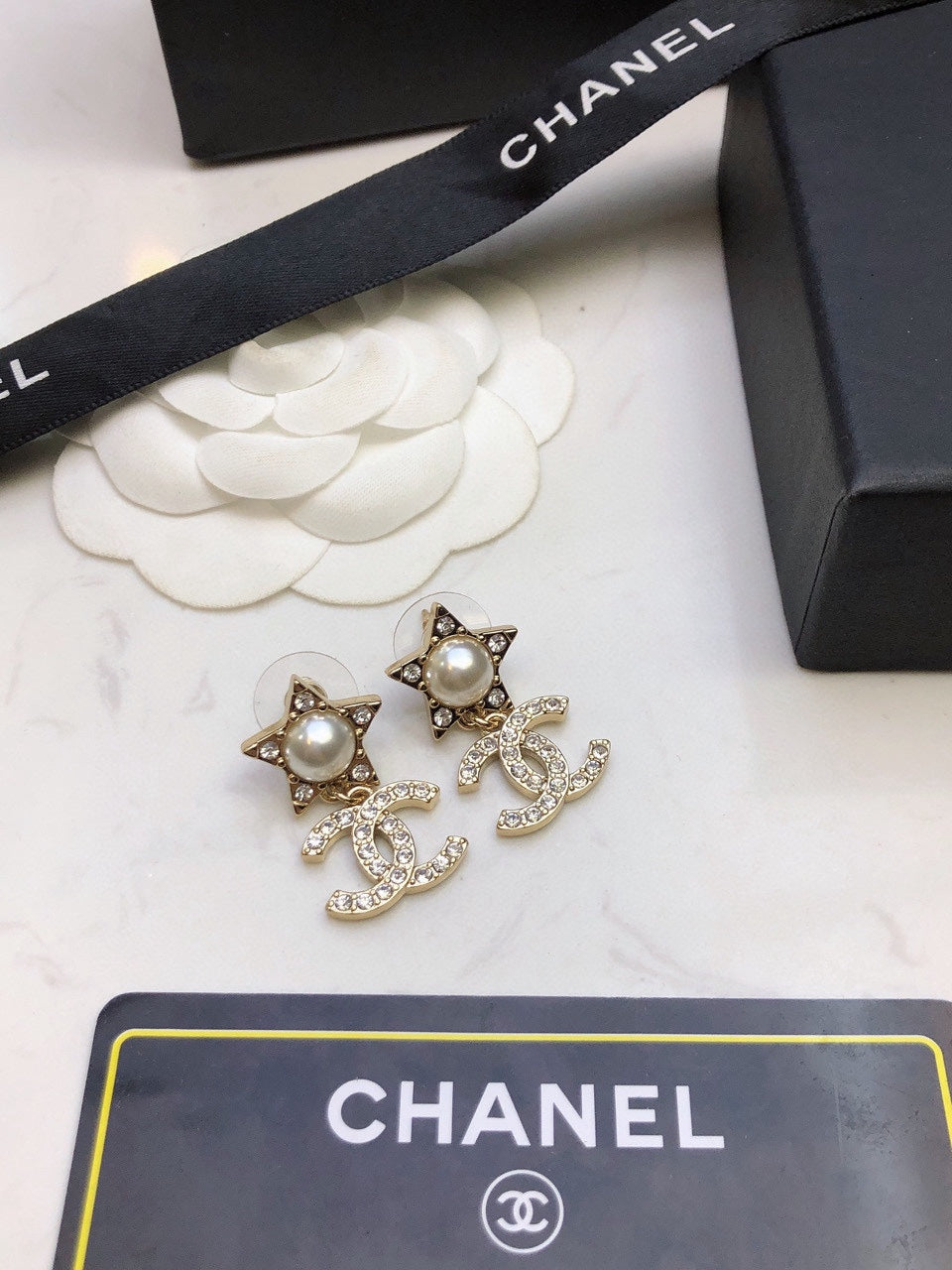 Martin Graham stud earrings in polished metal-tone – main product view