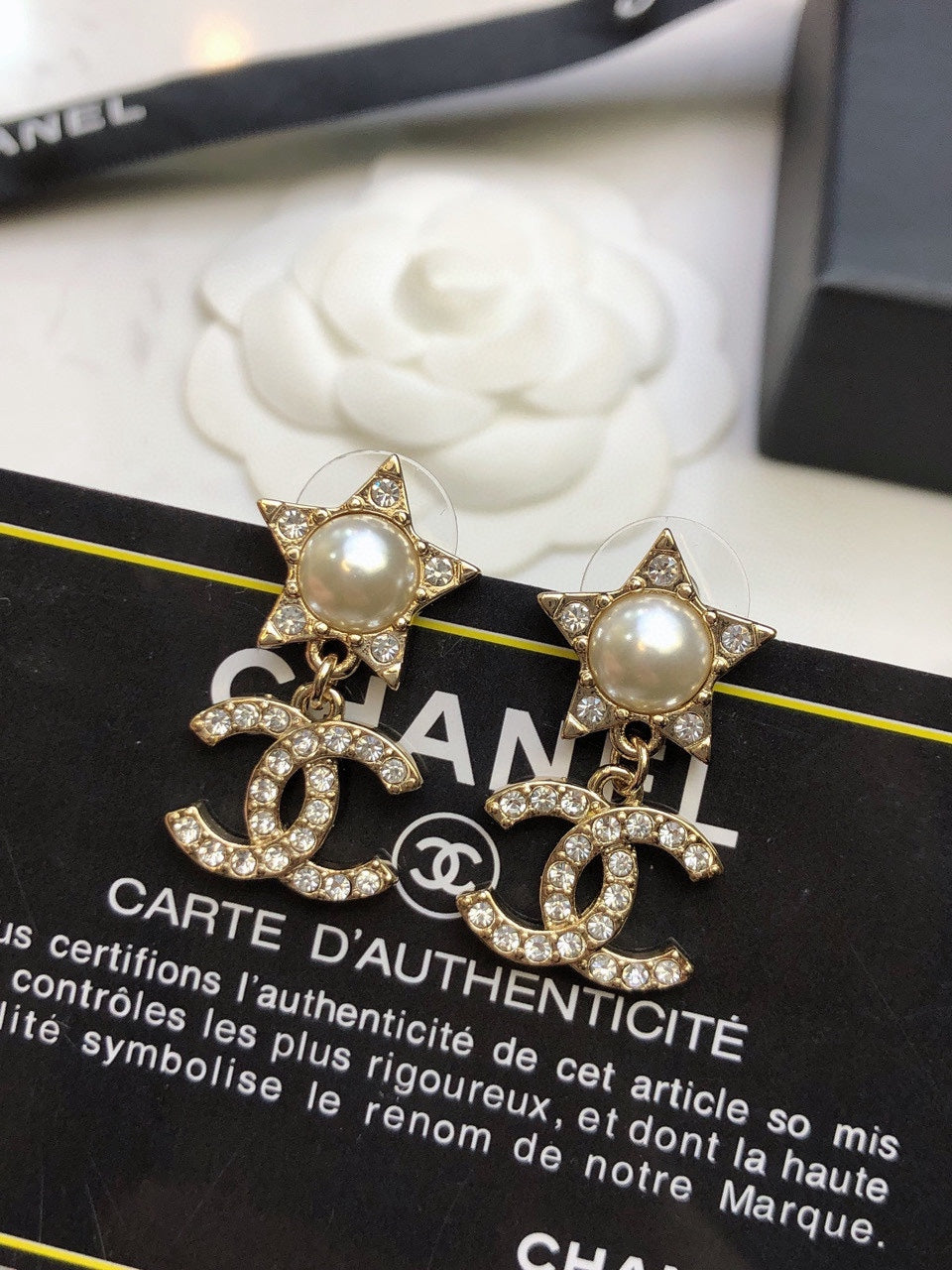 Martin Graham stud earrings in polished metal-tone – styled product view