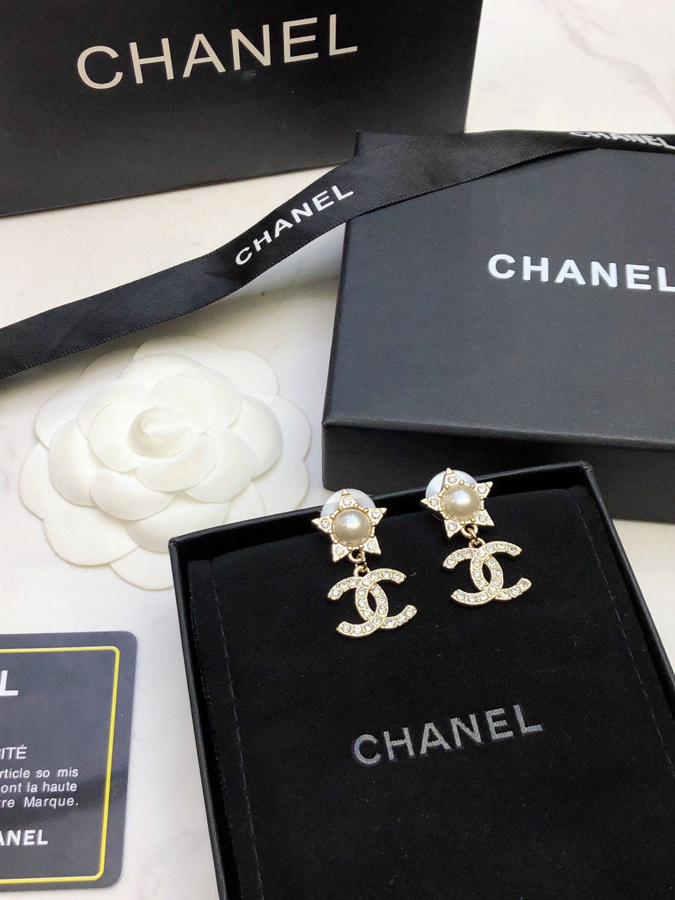 Martin Graham stud earrings in polished metal-tone – front product view