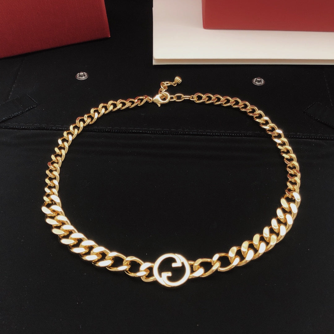 Martin Graham pendant necklace in polished metal-tone – detail view