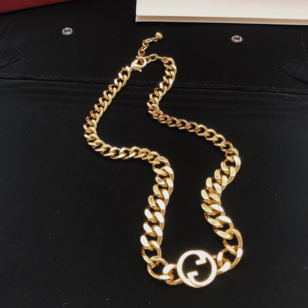 Martin Graham pendant necklace in polished metal-tone – side detail