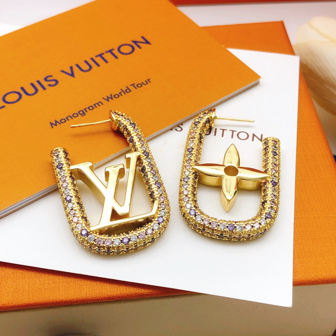 Martin Graham stud earrings in polished metal-tone – detail view