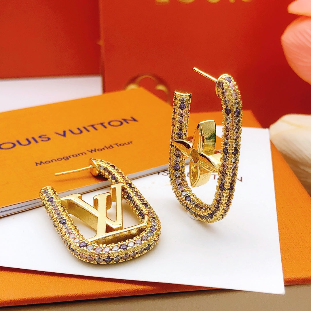 Martin Graham stud earrings in polished metal-tone – main product view