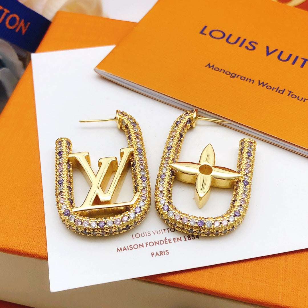 Martin Graham stud earrings in polished metal-tone – styled product view
