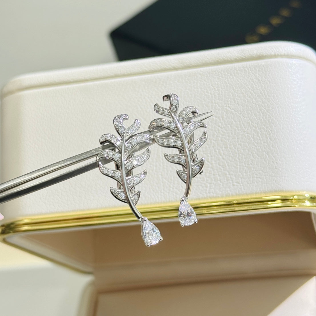 Martin Graham earrings in polished metal-tone – side detail