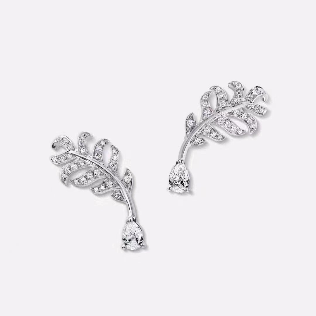 Martin Graham earrings in polished metal-tone – front product view