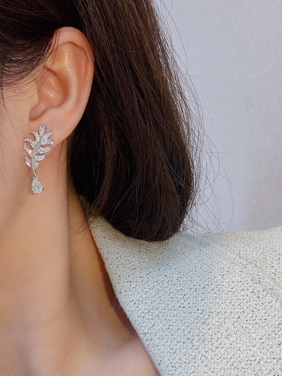 Martin Graham earrings in polished metal-tone – front product view