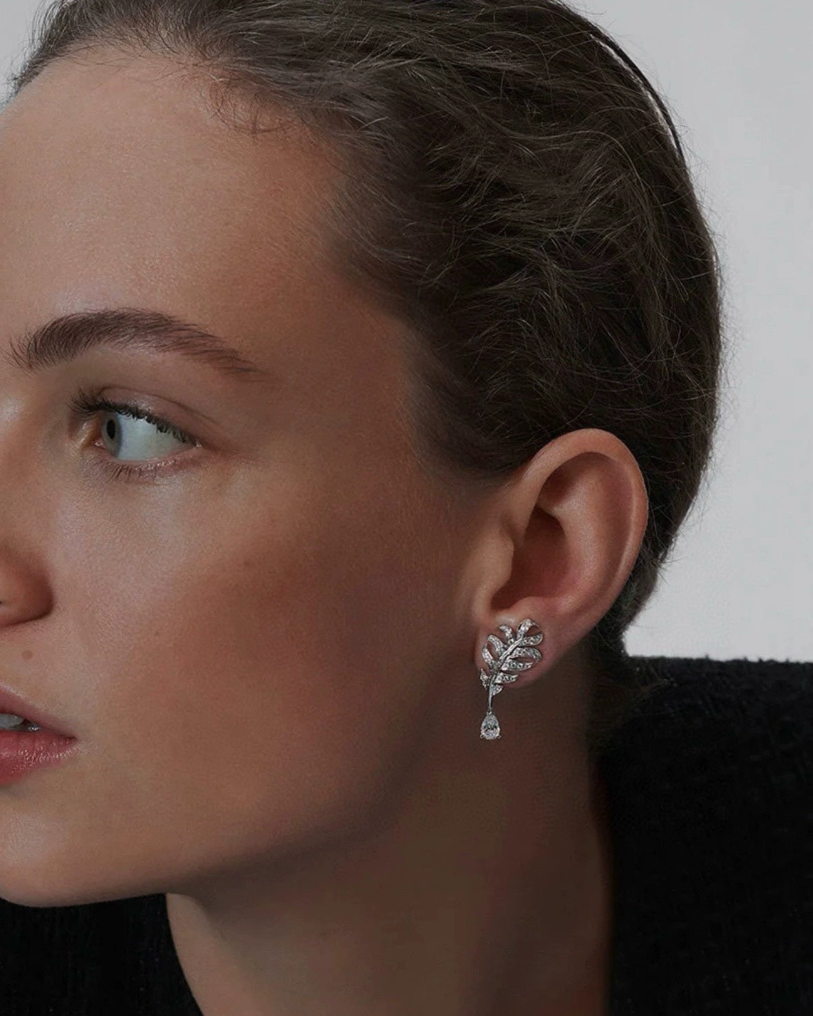Martin Graham earrings in polished metal-tone – close-up detail