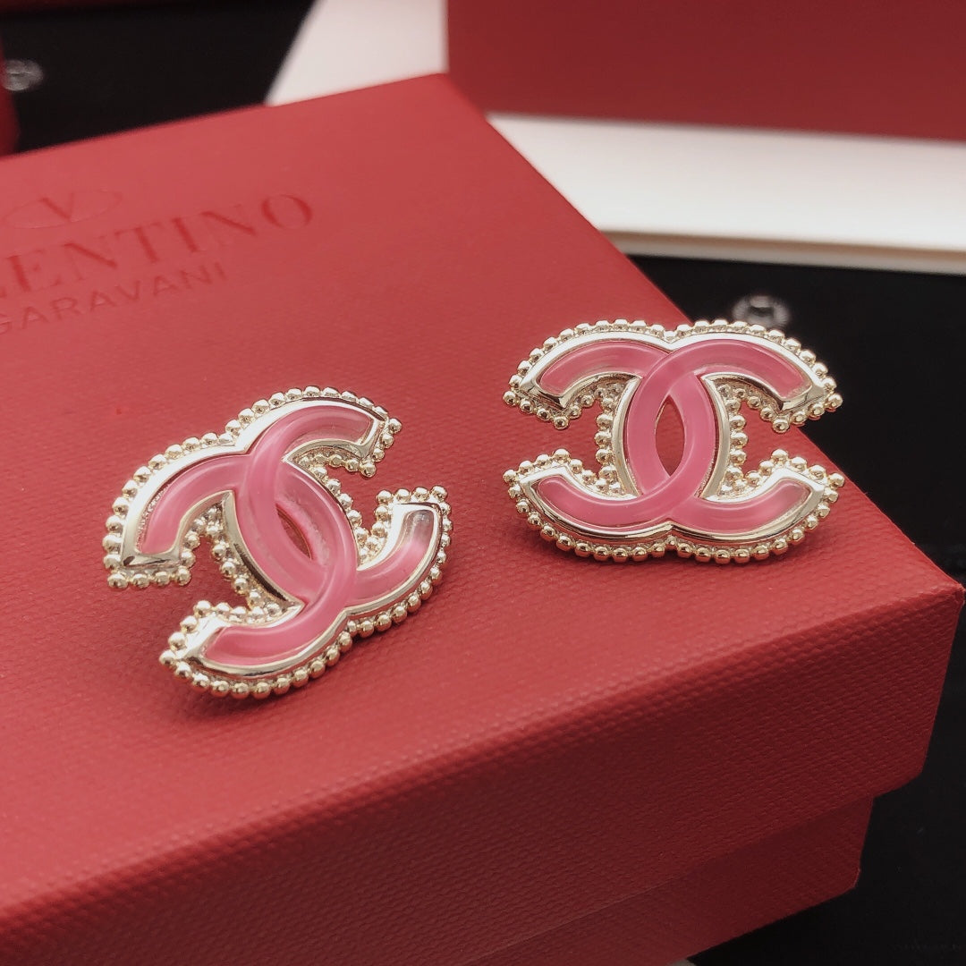 Martin Graham stud earrings in polished metal-tone – front product view