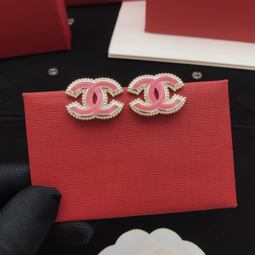 Martin Graham stud earrings in polished metal-tone – front product view