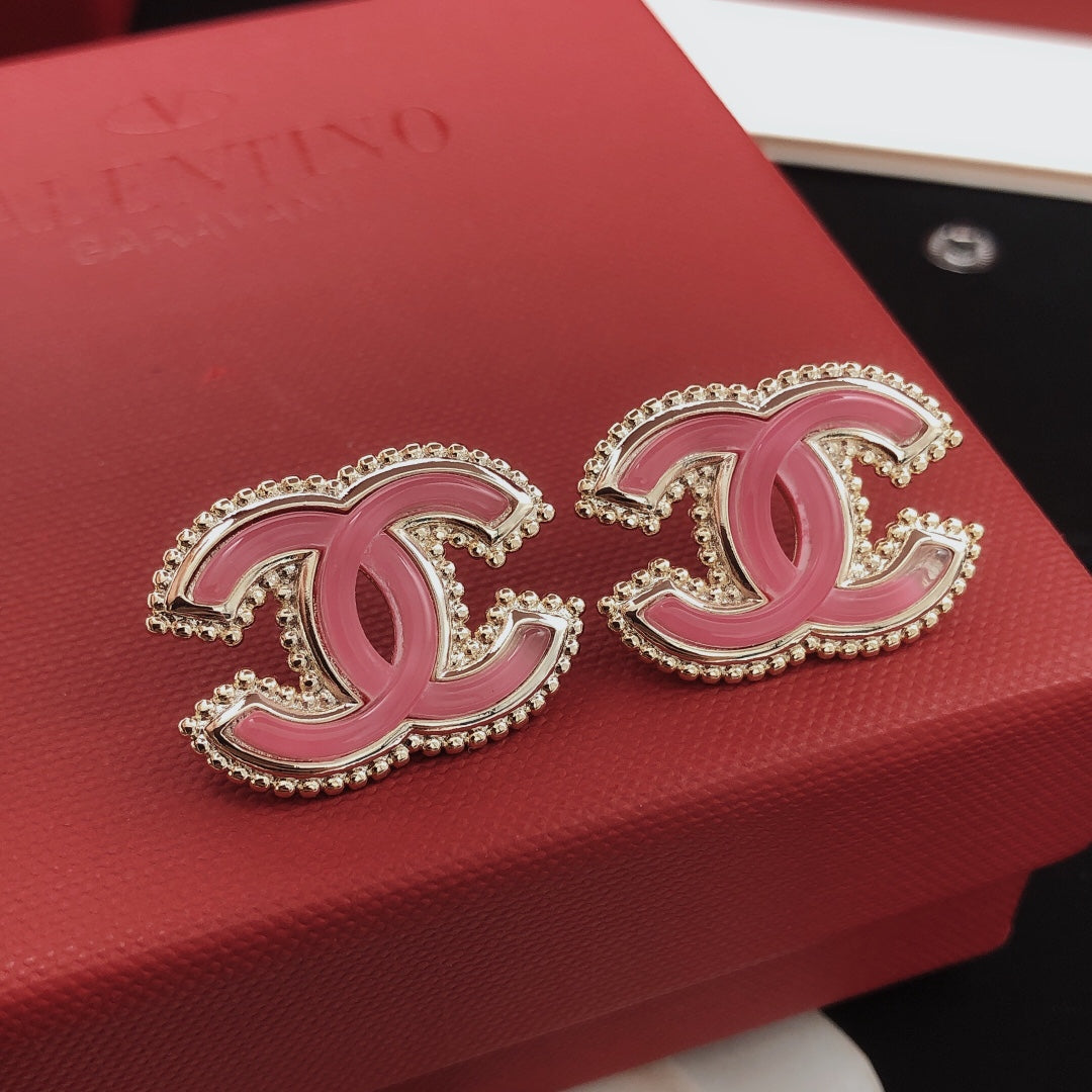 Martin Graham stud earrings in polished metal-tone – side detail