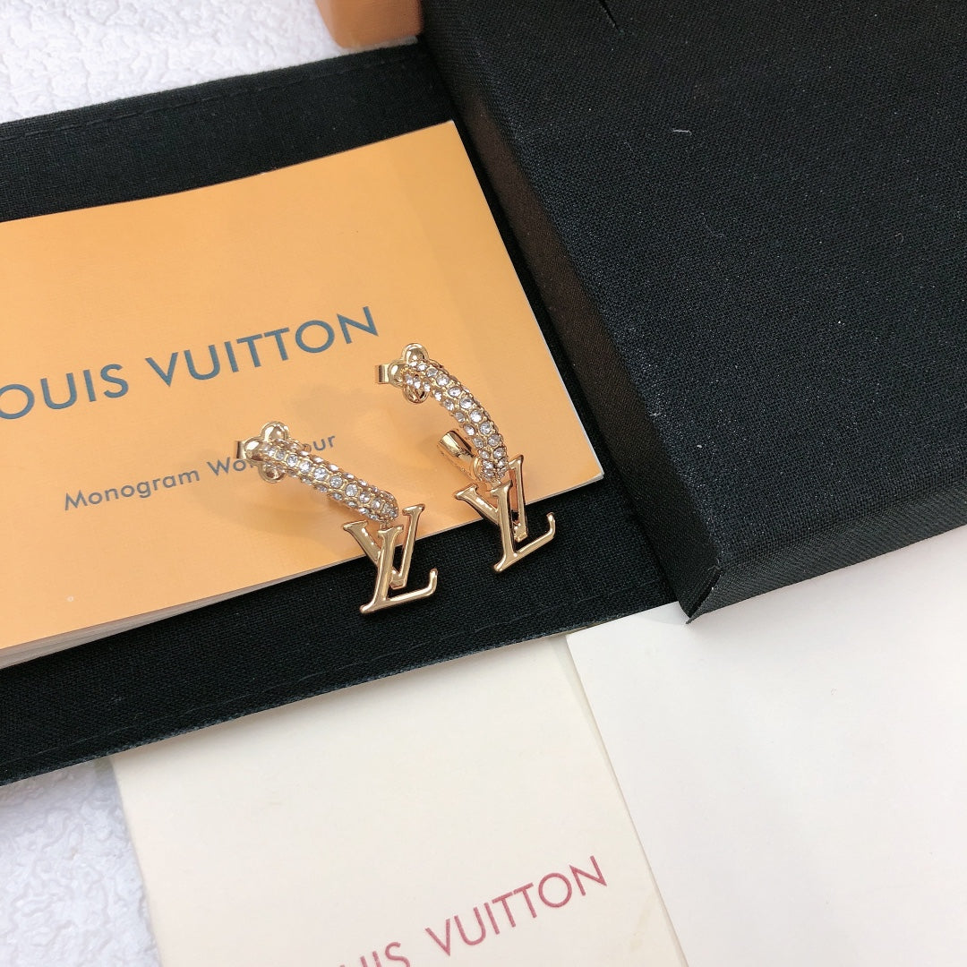 Martin Graham stud earrings in polished metal-tone – front product view