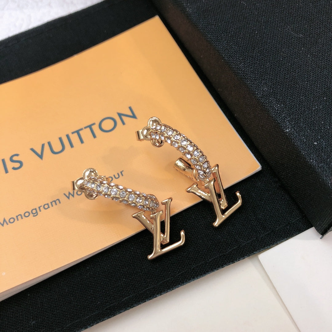 Martin Graham stud earrings in polished metal-tone – front product view