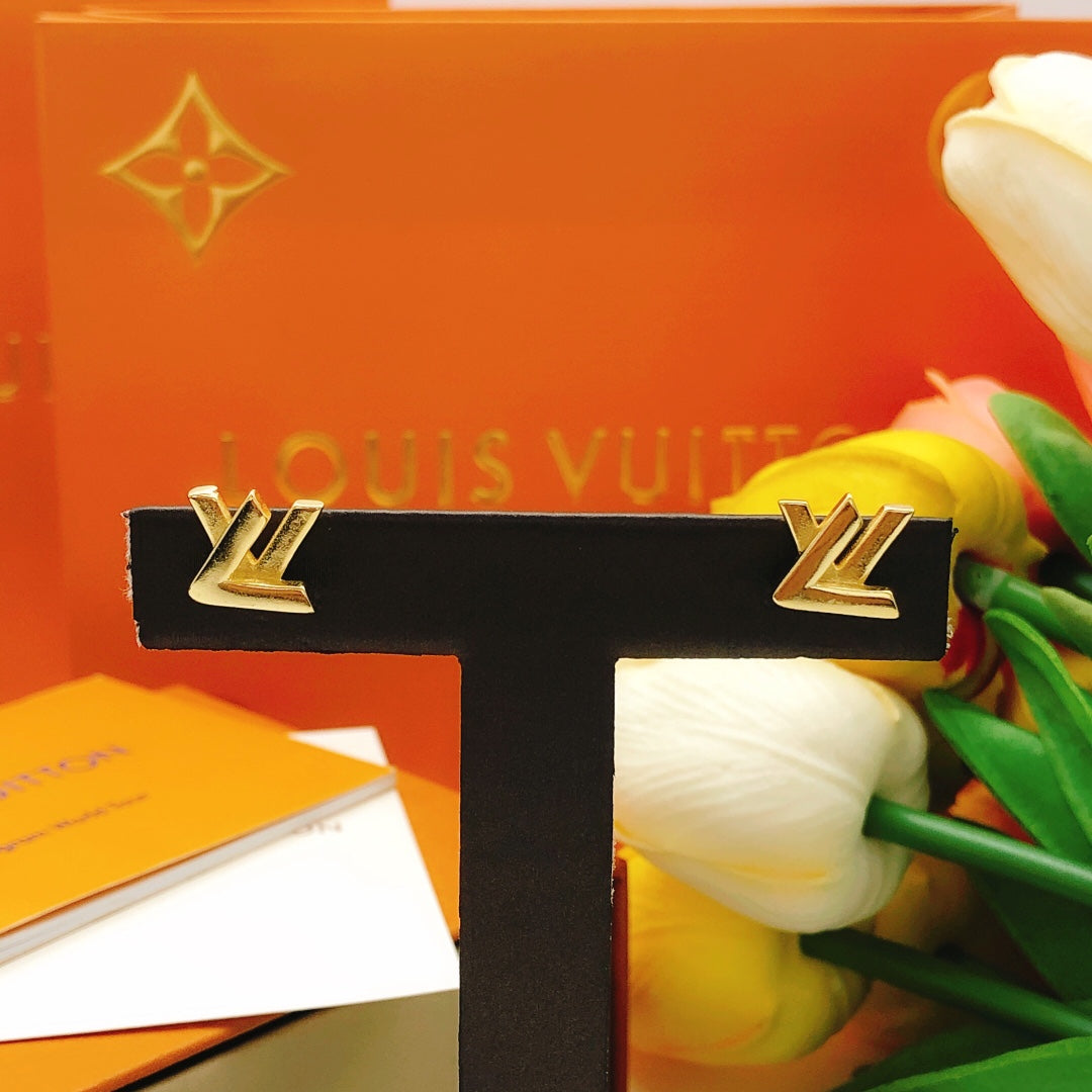 Martin Graham stud earrings in polished metal-tone – styled product view