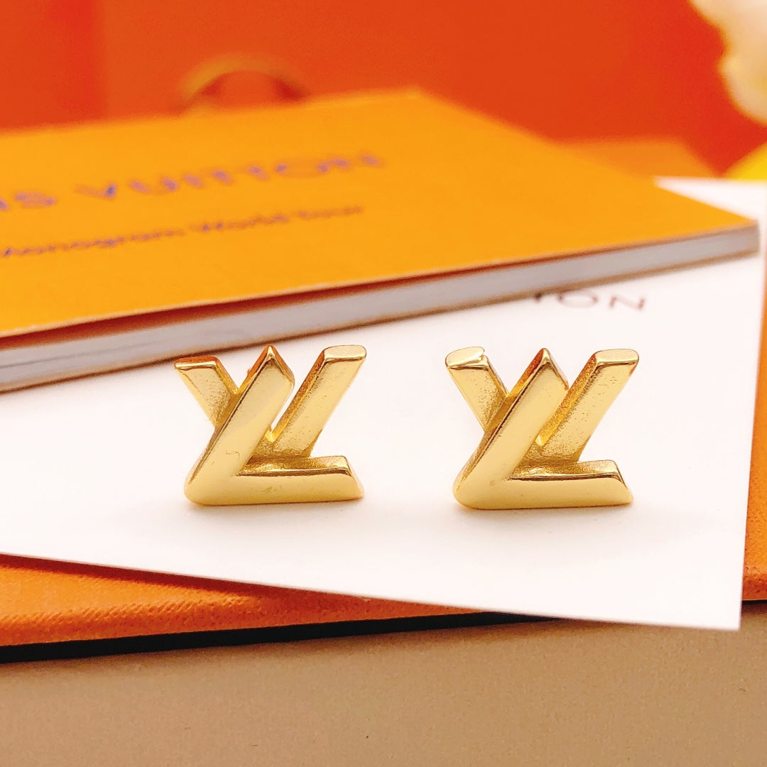 Martin Graham stud earrings in polished metal-tone – close-up detail