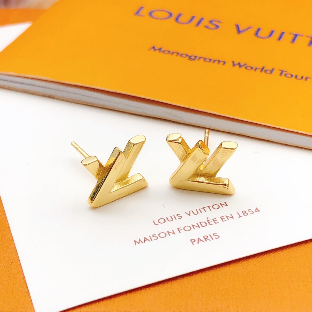 Martin Graham stud earrings in polished metal-tone – detail view