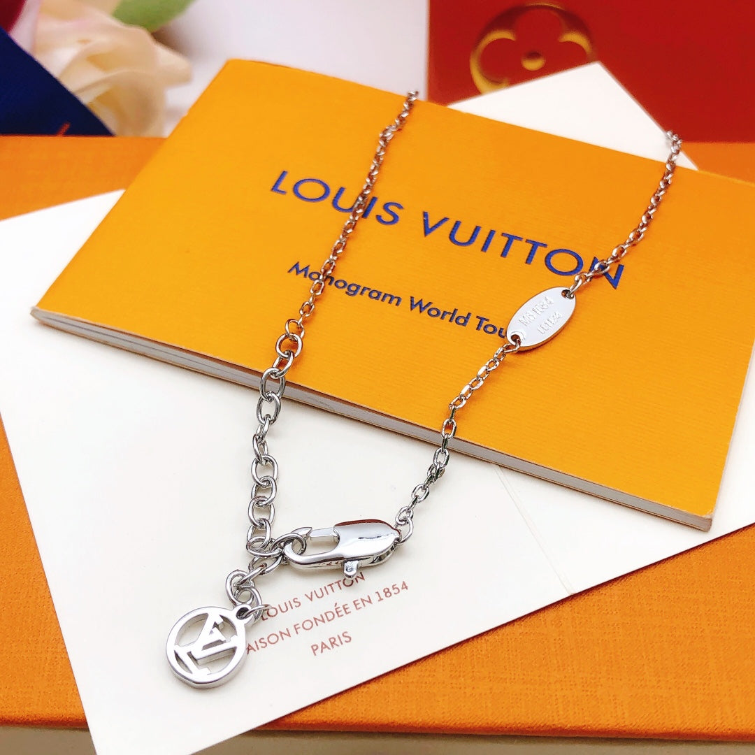 Martin Graham pendant necklace in polished metal-tone – close-up detail