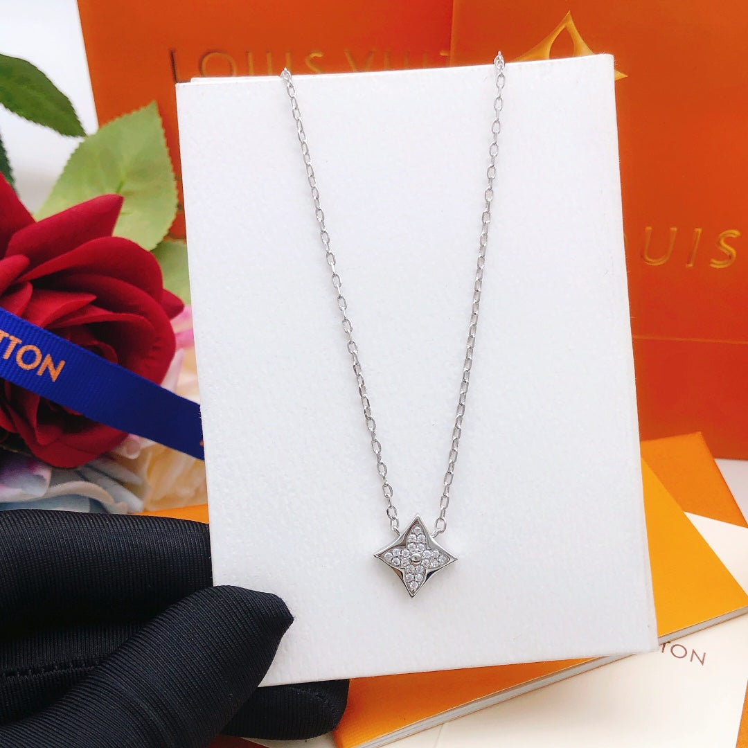 Martin Graham pendant necklace in polished metal-tone – side detail