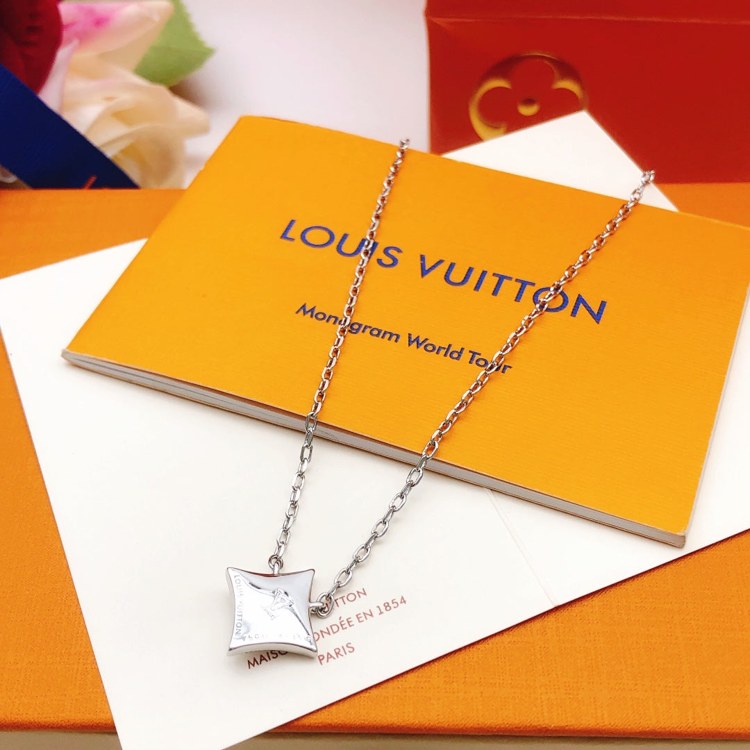 Martin Graham pendant necklace in polished metal-tone – detail view