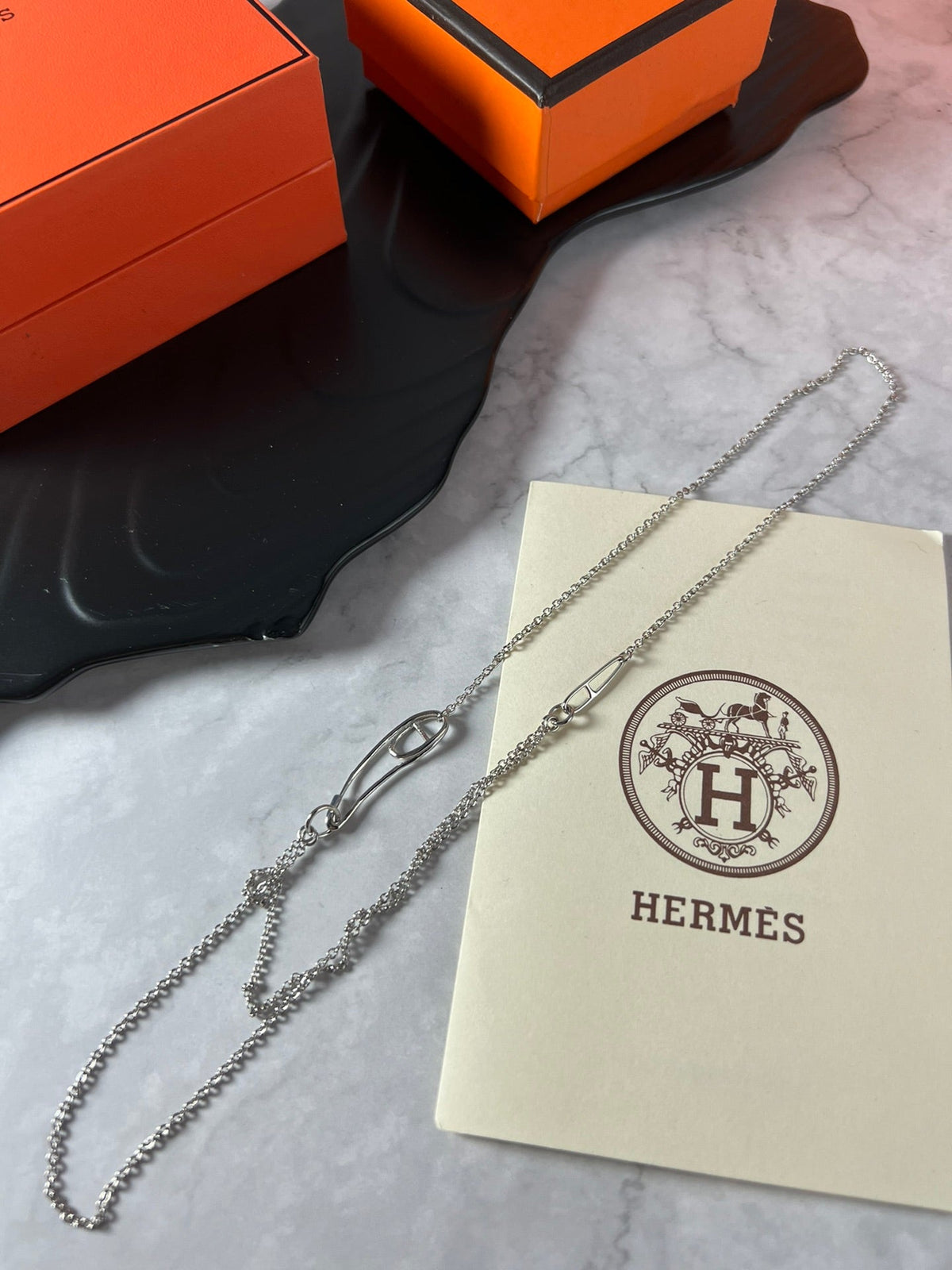 Martin Graham pendant necklace in polished metal-tone – detail view