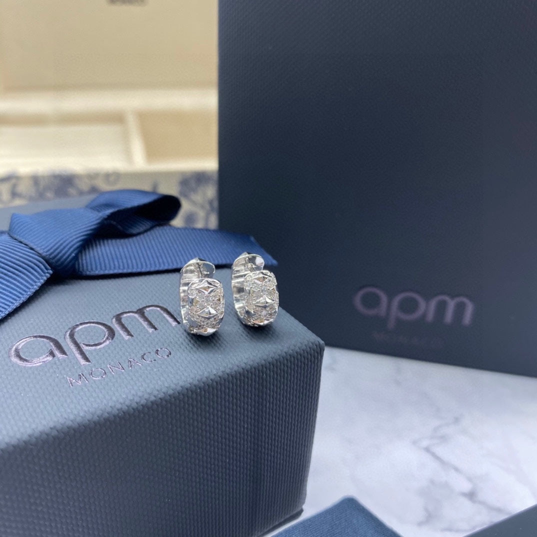 Martin Graham earrings in polished metal-tone – front product view