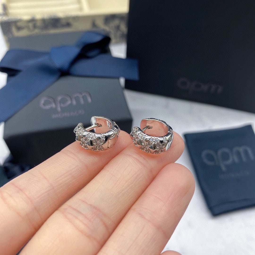 Martin Graham earrings in polished metal-tone – front product view