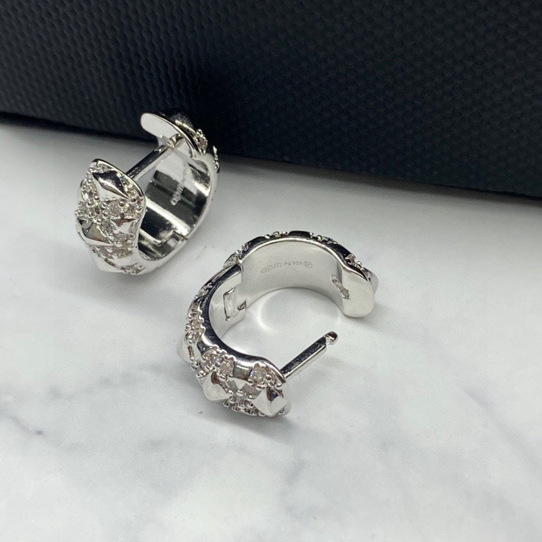 Martin Graham earrings in polished metal-tone – styled product view