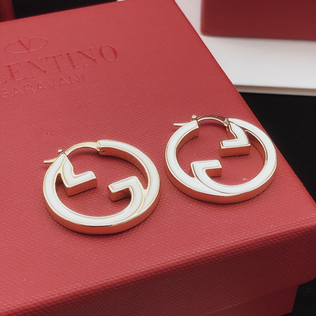Martin Graham earrings in polished metal-tone – detail view