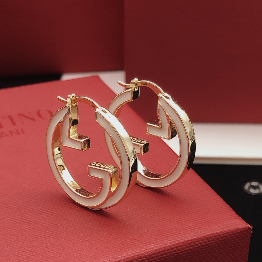 Martin Graham earrings in polished metal-tone – main product view