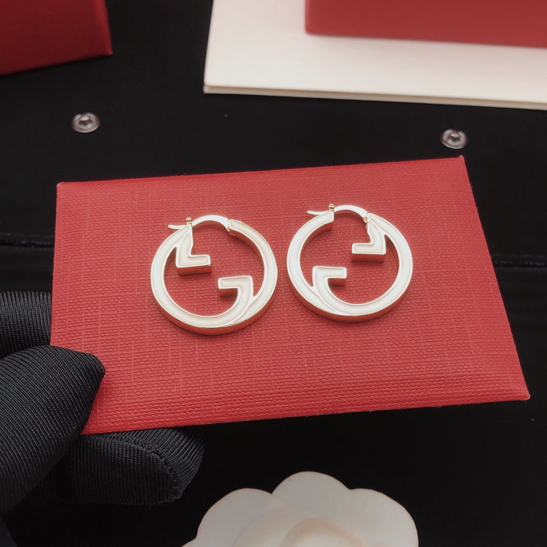 Martin Graham earrings in polished metal-tone – side detail