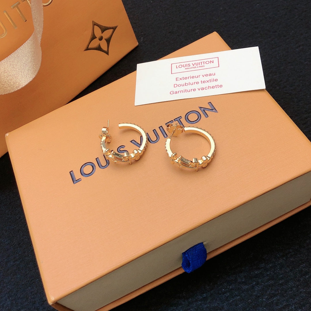 Martin Graham stud earrings in polished metal-tone – main product view