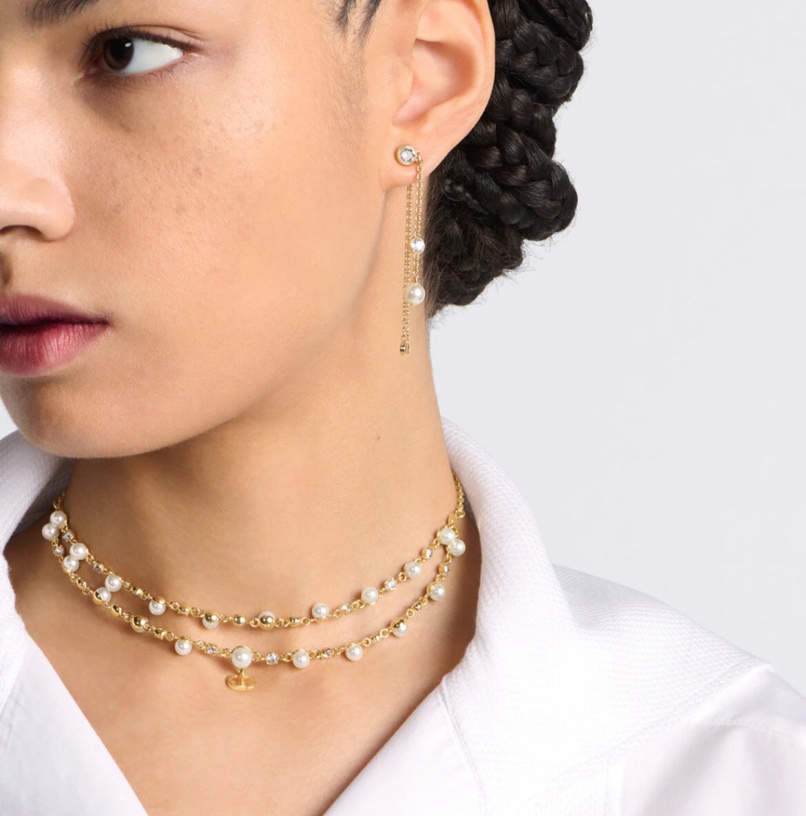 Martin Graham pendant necklace in polished metal-tone – close-up detail