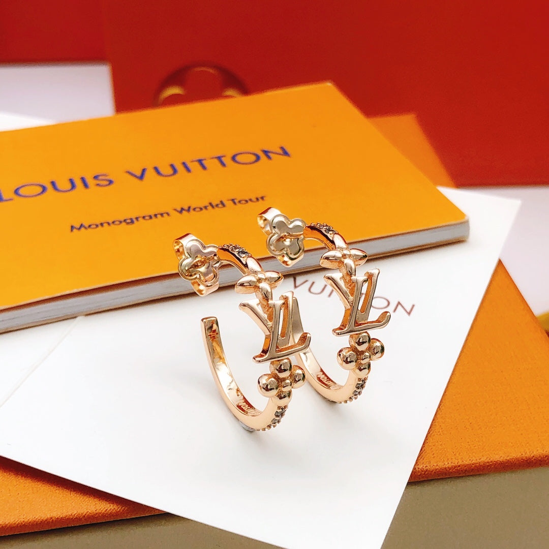 Martin Graham earrings in polished metal-tone – front product view