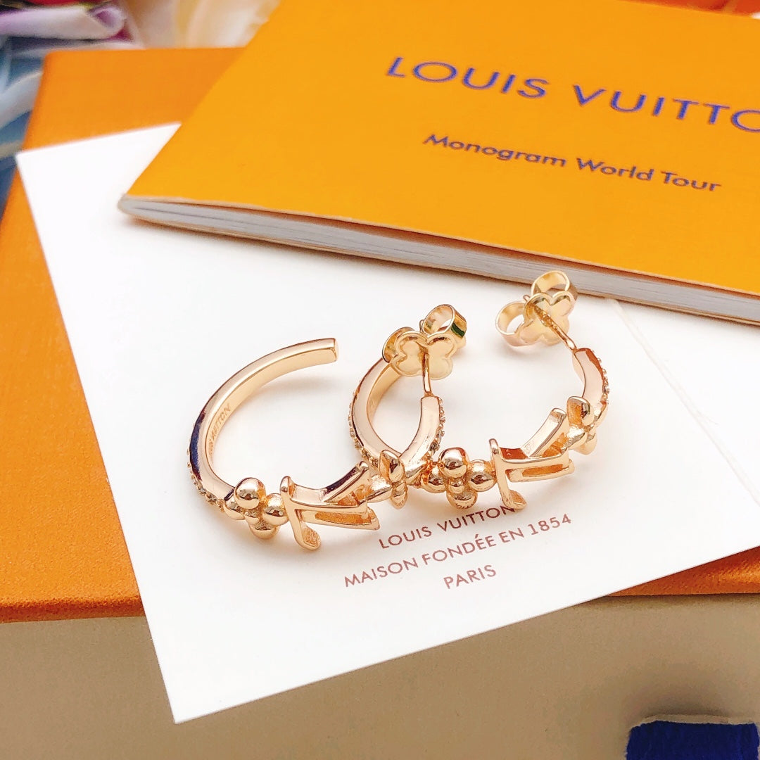 Martin Graham earrings in polished metal-tone – close-up detail