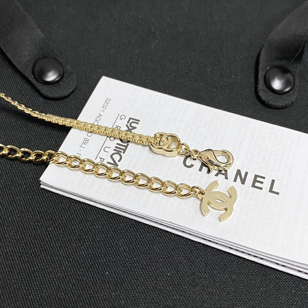 Martin Graham jewelry accessory in polished metal-tone – side detail
