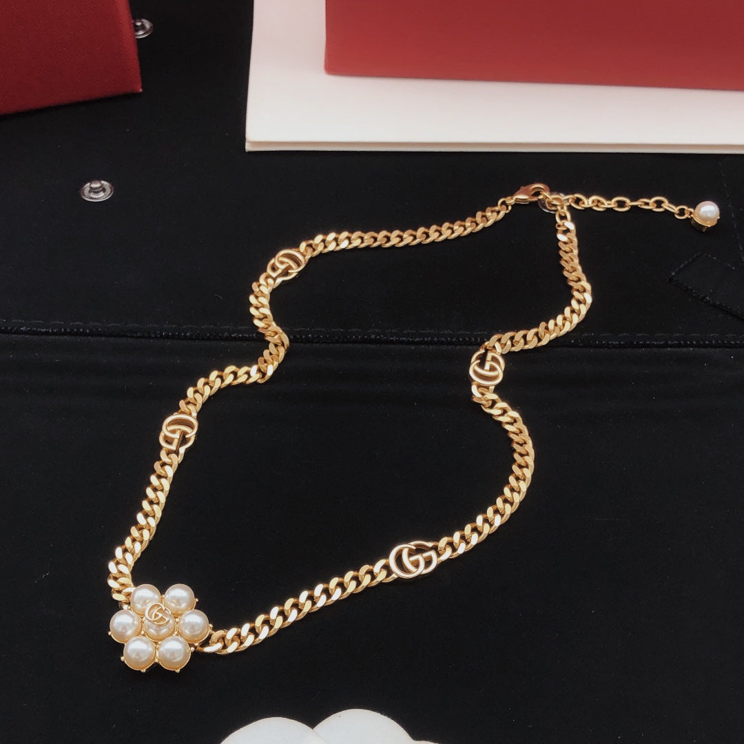 Martin Graham pendant necklace in polished metal-tone – styled product view
