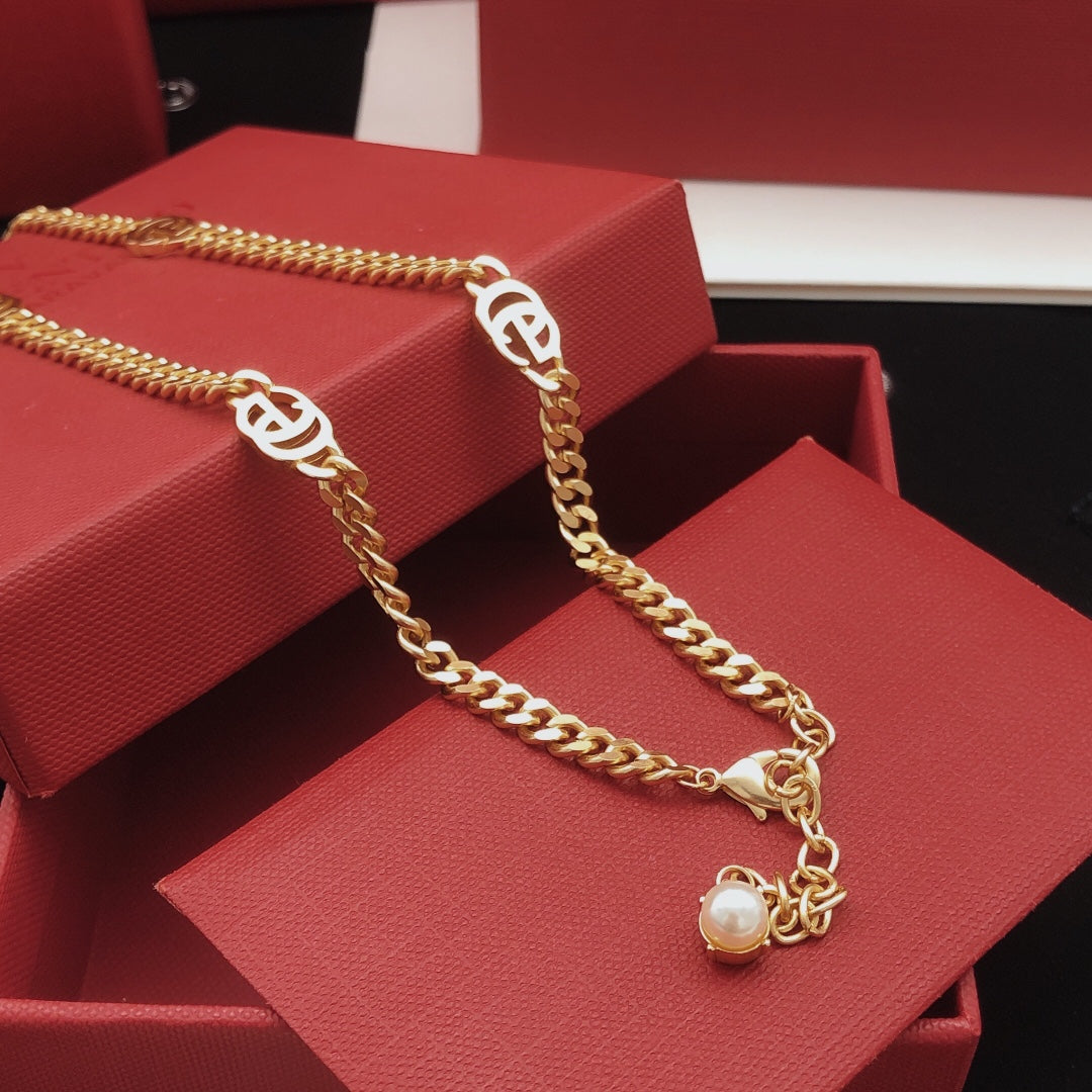 Martin Graham pendant necklace in polished metal-tone – front product view