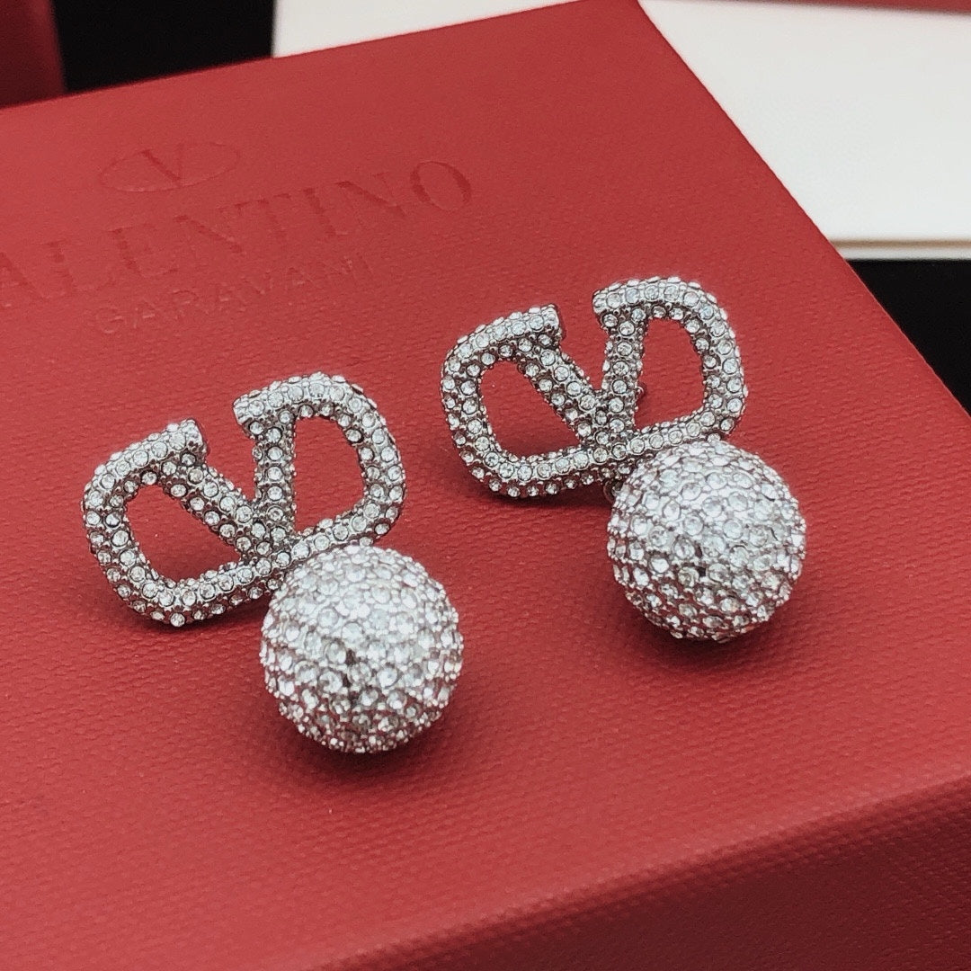Martin Graham stud earrings in polished metal-tone – main product view