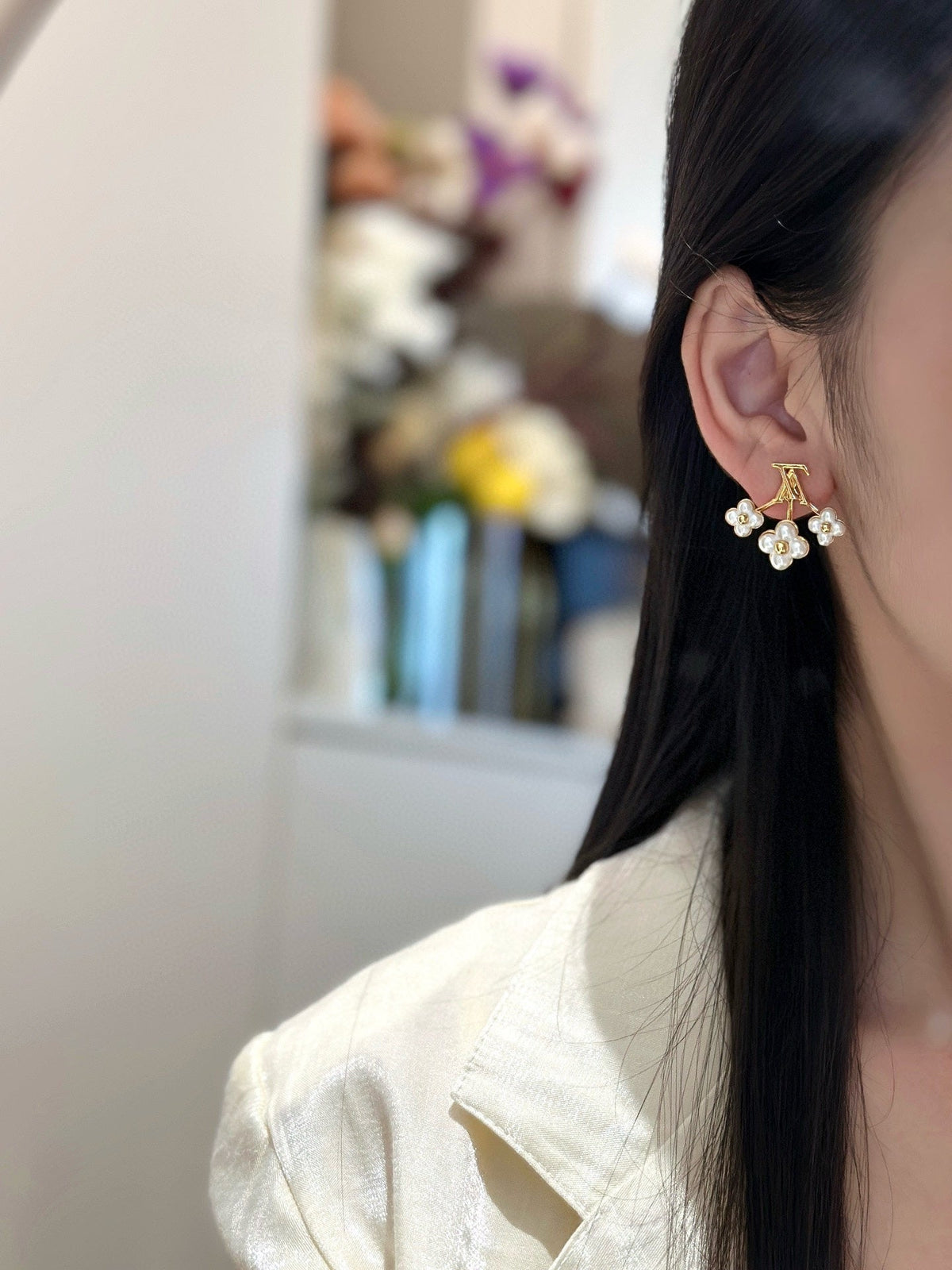 Martin Graham earrings in polished metal-tone – front product view