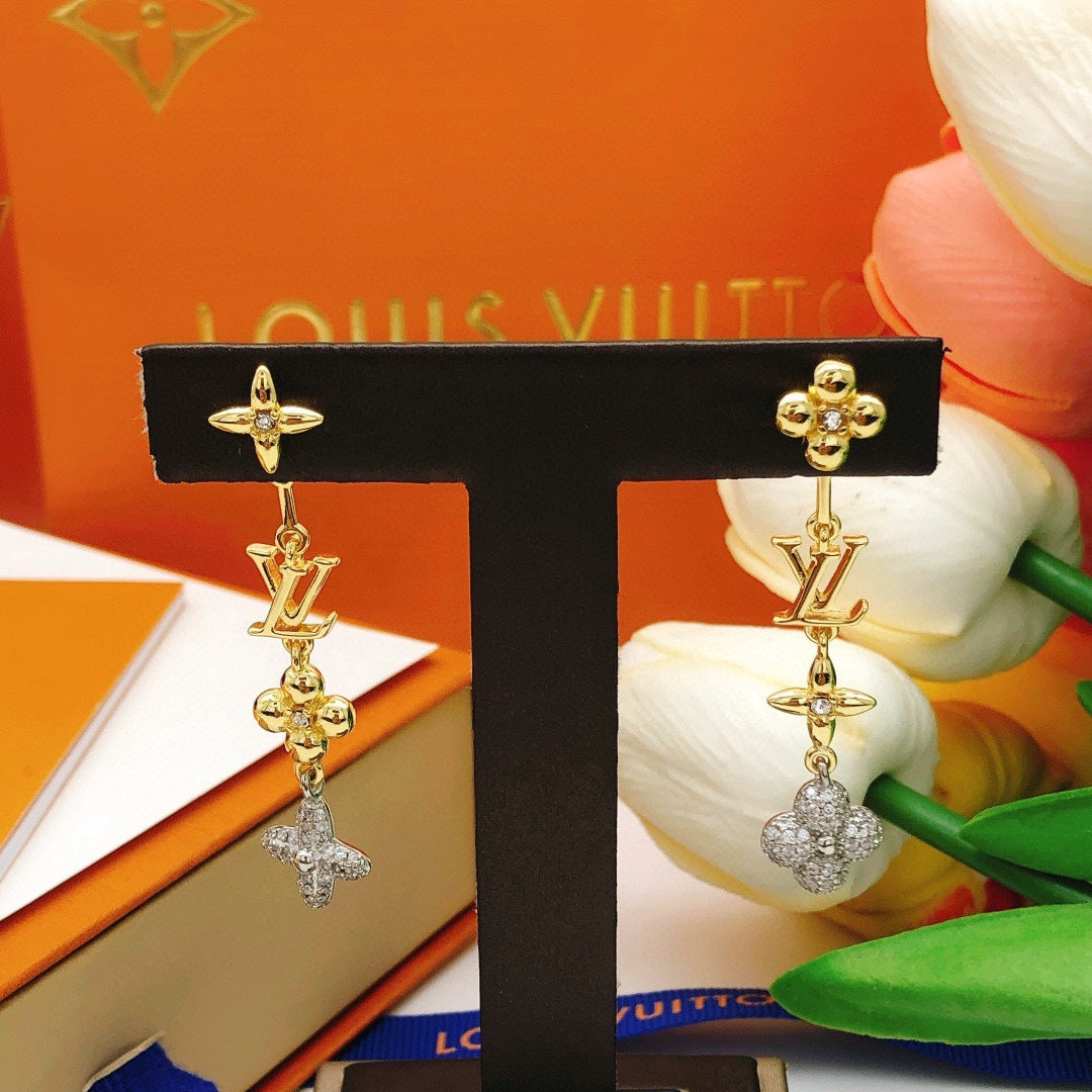 Martin Graham stud earrings in polished metal-tone – styled product view