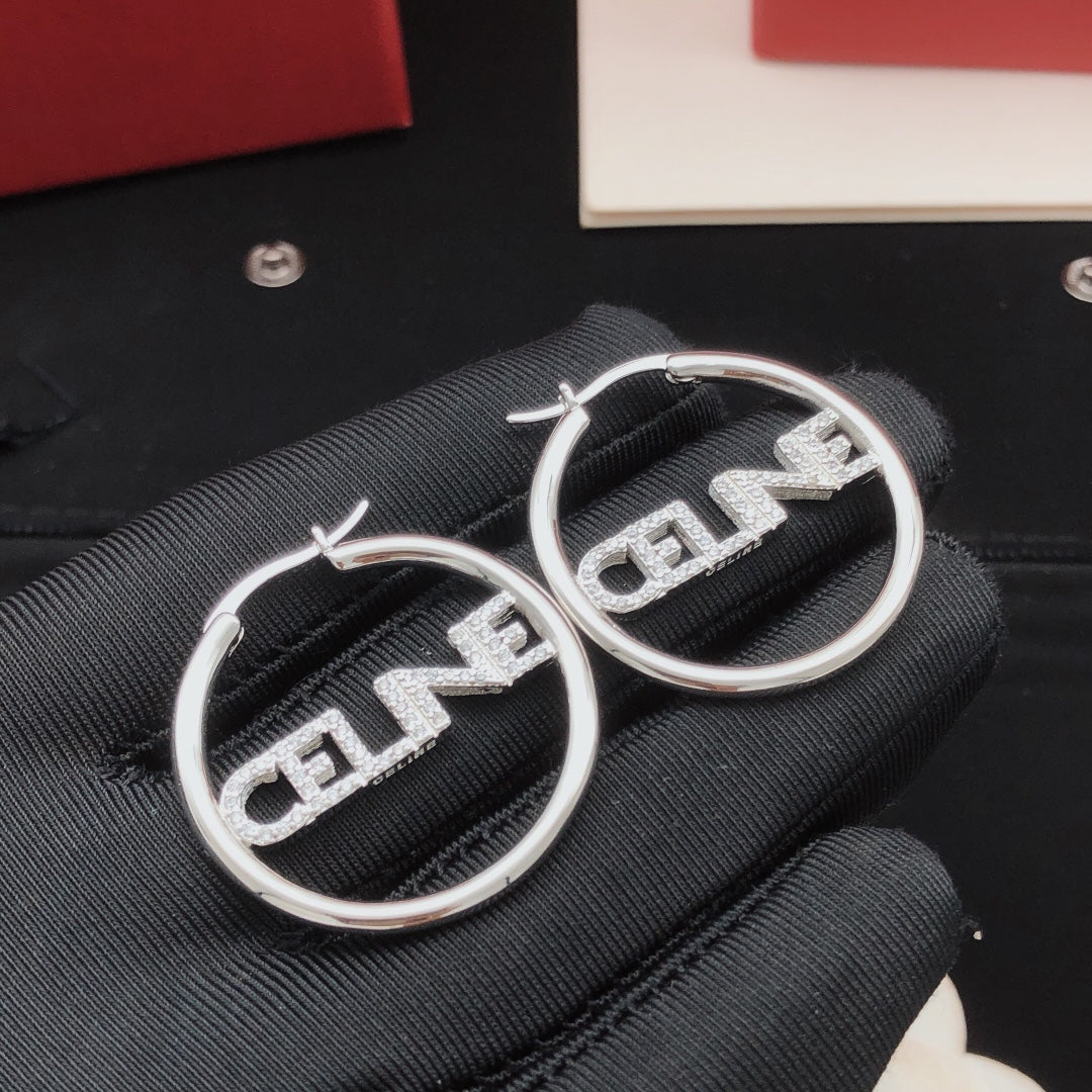 Martin Graham drop earrings in polished metal-tone – main product view
